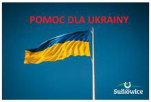 Flaga Ukrainy na tle nieba, logo gminy Sułkowice